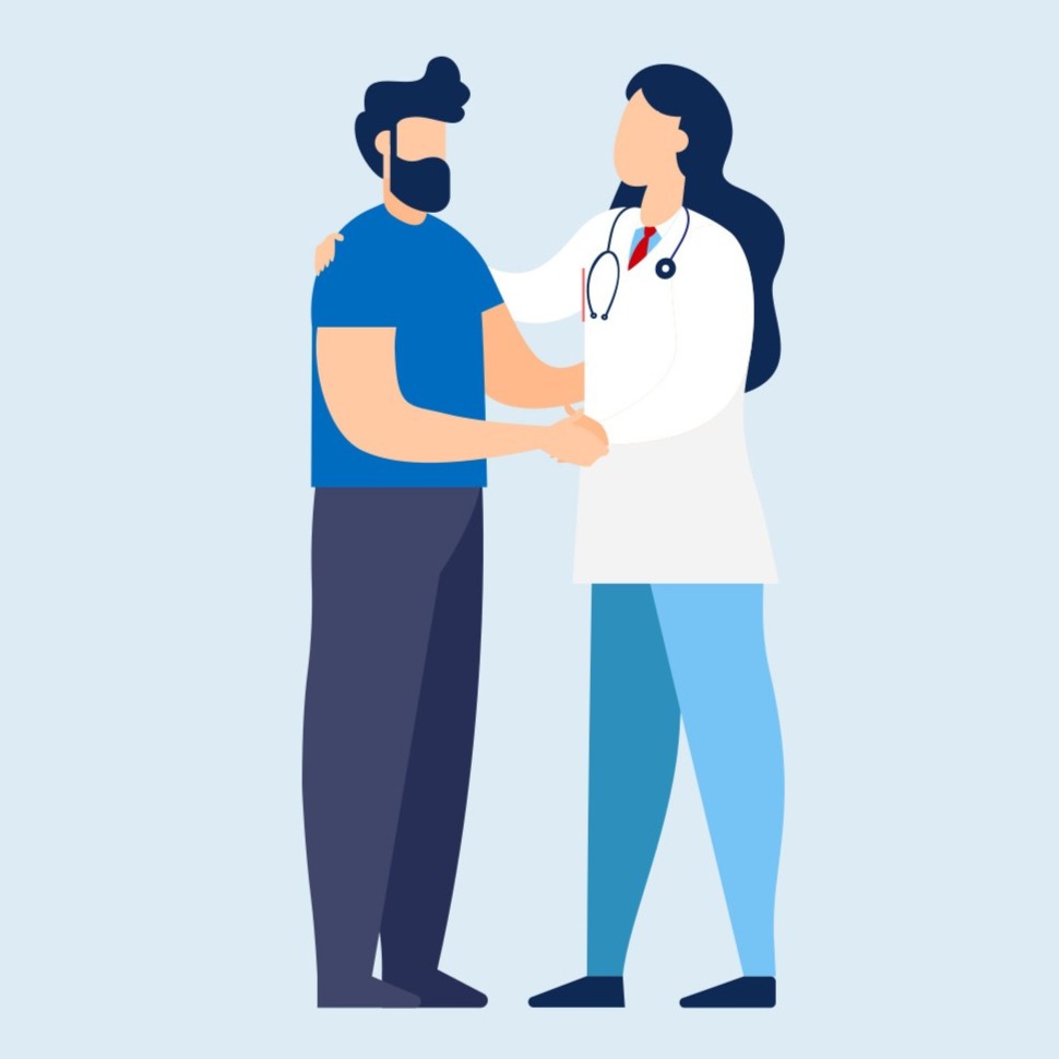 Uomo visitato da un medico